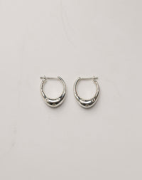 Pair of silver hoop earrings with circle engravings, inspired by Strawberries.