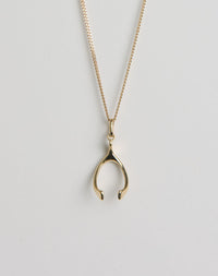Gold wishbone pendant necklace 