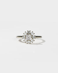 Diamond ring on a light gray background