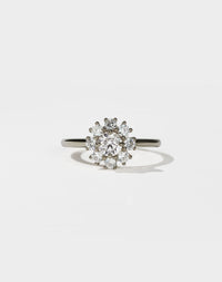 Diamond ring on a light gray background