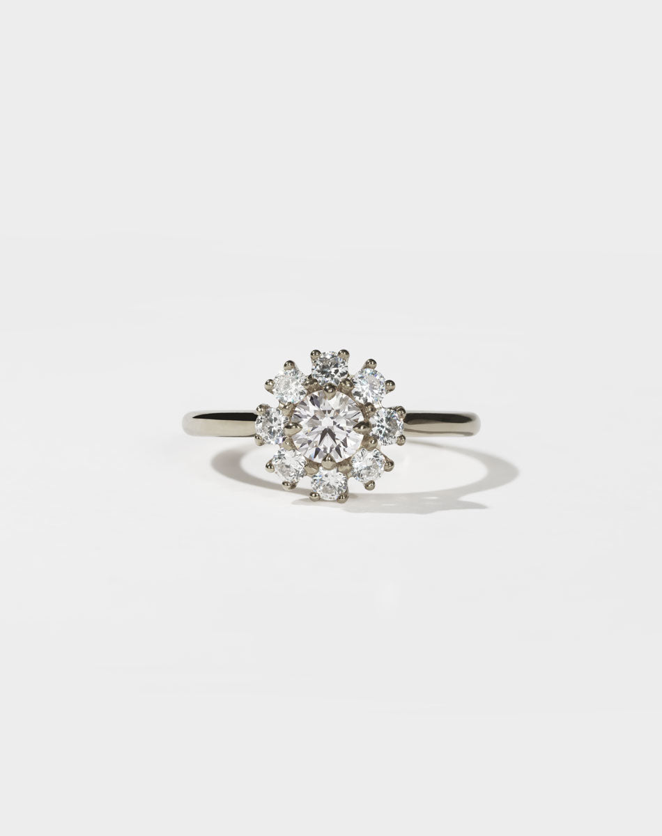Diamond ring on a light gray background