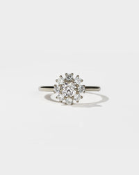 Diamond ring on a light gray background