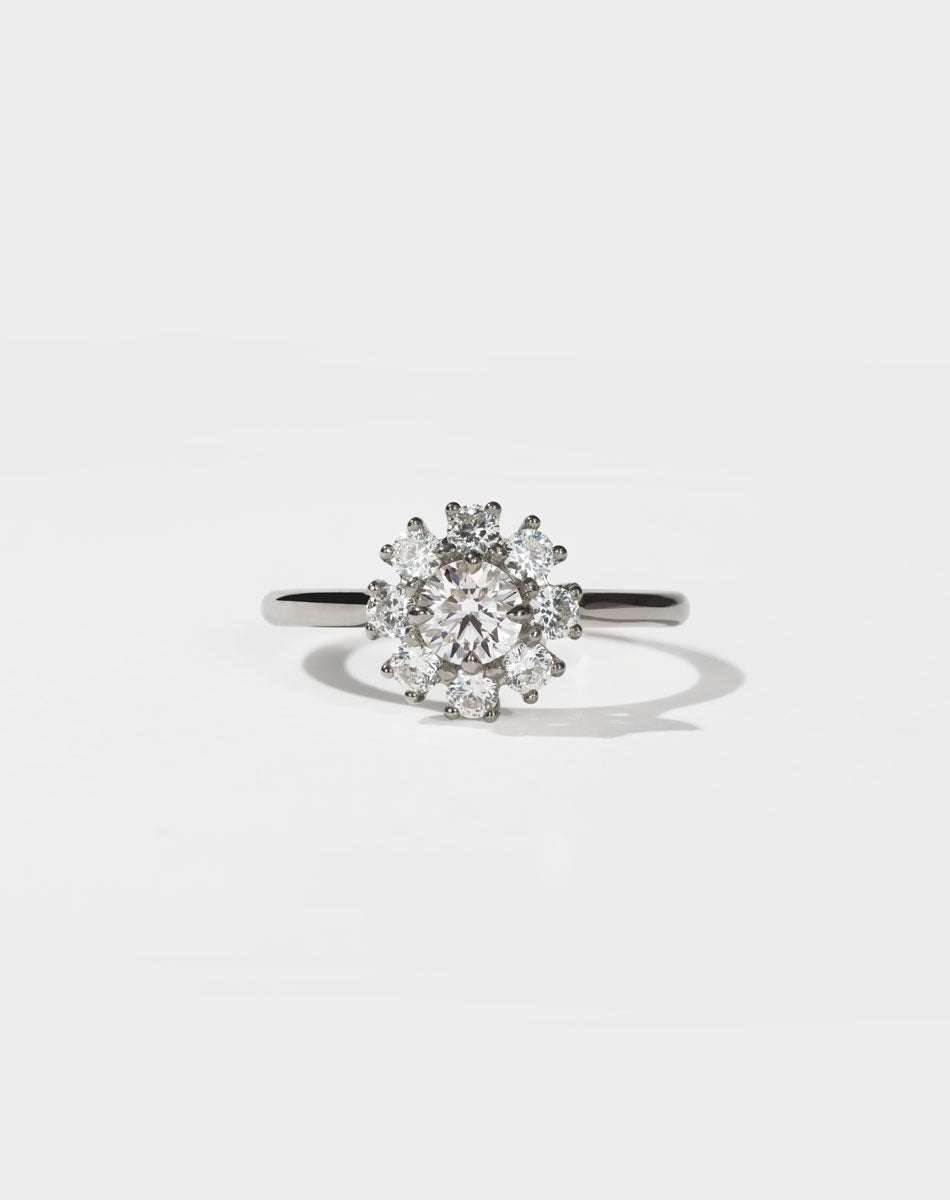 Diamond ring on a light gray background