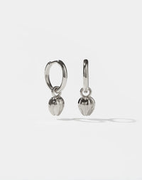 Pair of silver Tulip bud  charm earrings on a white background