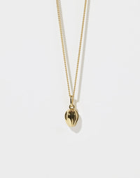 Gold tulip motif necklace with a pendant on a white background