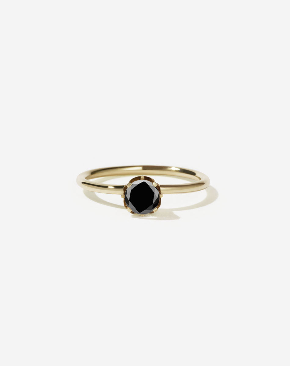 Meadowlark Jewellery’s classic Signature Solitaire Engagement Ring in 9ct Yellow Gold, with 0.46ct round brilliant cut black diamond. Set into our signature Meadowlark claw setting, featuring graphic lines inspired by our insignia. One of our most timeless and beloved Ceremonial designs, made to order in New Zealand. Pair with the diamond pave set Signature Eternity Wedding Band.