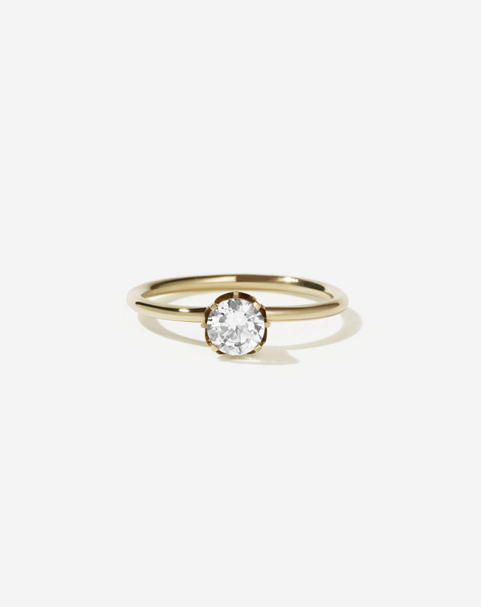 Meadowlark Jewellery’s classic Signature Solitaire Engagement Ring in 9ct Yellow Gold, with 0.46ct round brilliant cut white diamond. Set into our signature Meadowlark claw setting, featuring graphic lines inspired by our insignia. One of our most timeless and beloved Ceremonial designs, made to order in New Zealand. Pair with the diamond pave set Signature Eternity Wedding Band.