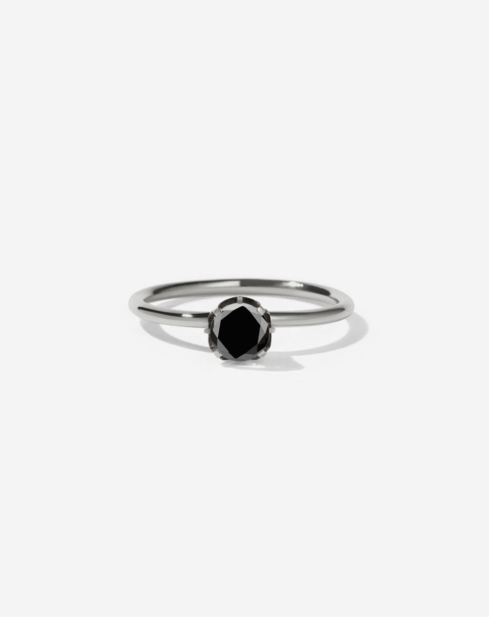 Meadowlark Jewellery’s classic Signature Solitaire Engagement Ring in Platinum, with 0.46ct round brilliant cut black diamond. Set into our signature Meadowlark claw setting, featuring graphic lines inspired by our insignia. One of our most timeless and beloved Ceremonial designs, made to order in New Zealand. Pair with the diamond pave set Signature Eternity Wedding Band.
