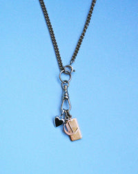 A gold swivel chain necklace for attaching your favourite charms, shown with 3 charms