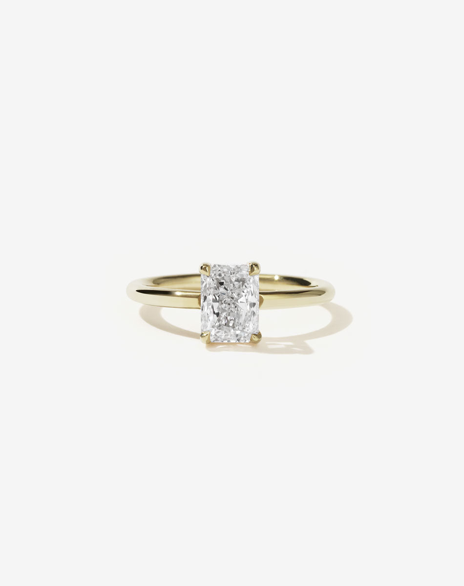 Radiant cut diamond Solitaire yellow gold engagement ring