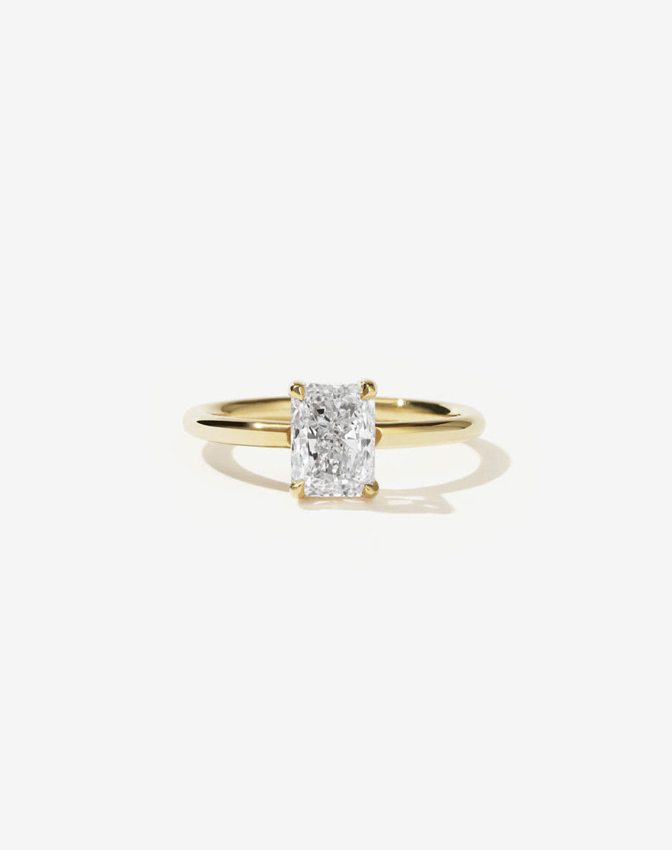 Radiant cut diamond Solitaire yellow gold engagement ring
