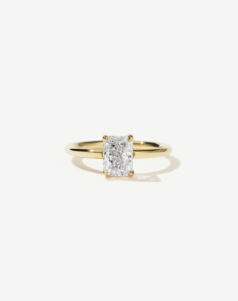 Radiant cut diamond Solitaire yellow gold engagement ring