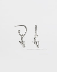 A pair of sterling silver hoop earrings with small banana charms