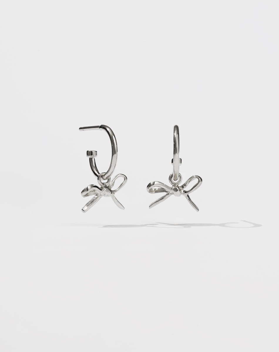 Silver earrings with bow charms