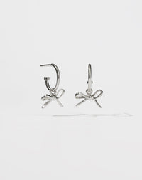 Silver earrings with bow charms
