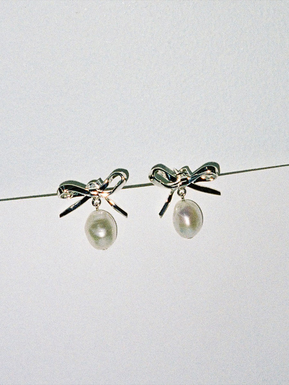 Our most loved Bow Pearl Studs
