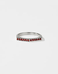 Meadowlark Jewellery’s architectural Geo Ring Arc in Sterling Silver, pave set with twelve round brilliant cut red sapphires atop a 1.5mm. A striking piece designed to be worn with the Geo Flat & Geo Point rings, or alone for a refined and minimal look. From the Dreams collection.
