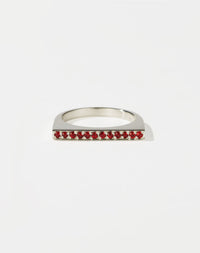 Meadowlark Jewellery’s architectural Geo Ring Flat in Sterling Silver, pave set with twelve round brilliant cut red sapphires atop a 1.5mm. A striking piece designed to be worn with the Geo Arc & Geo Point rings, or alone for a refined and minimal look. From the Dreams collection.
