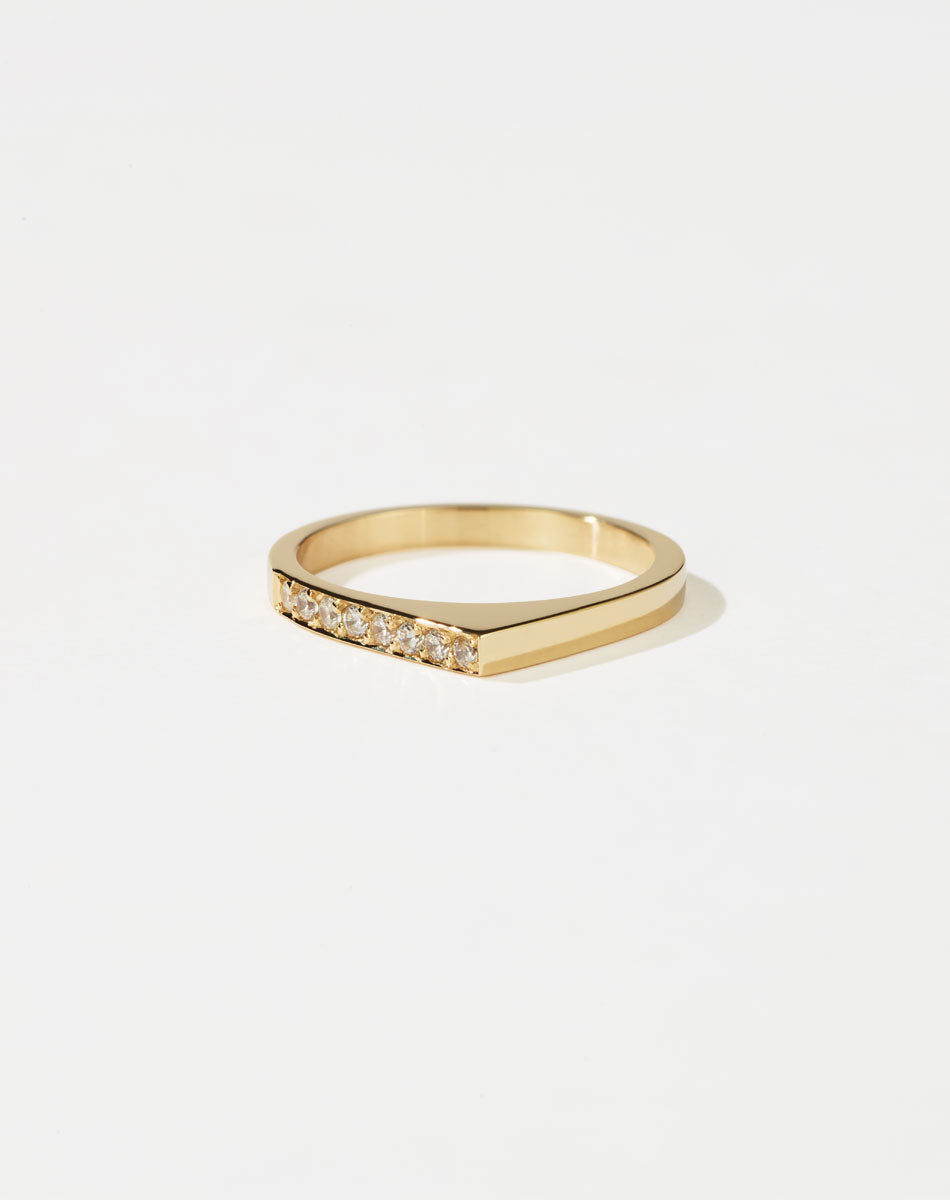 Meadowlark Jewellery’s architectural Geo Ring Point in 9ct Yellow Gold, pave set with twelve round brilliant cut white diamonds atop a 1.5mm. A striking piece designed to be worn with the Geo Flat & Geo Arc rings, or alone for a refined and minimal look. From the Dreams collection.