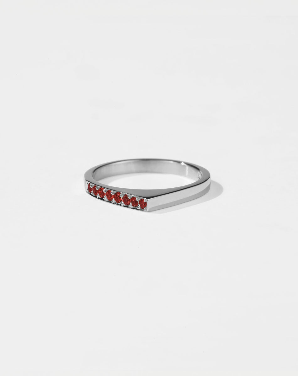 Meadowlark Jewellery’s architectural Geo Ring Point in Sterling Silver, pave set with twelve round brilliant cut red sapphires atop a 1.5mm. A striking piece designed to be worn with the Geo Flat & Geo Arc rings, or alone for a refined and minimal look. From the Dreams collection.