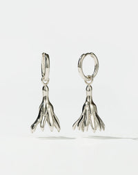 Meadowlark Jewellery’s sculptural Magda Drop Earrings Medium in Sterling Silver. Bell-shaped flowers suspended from our classic Aria Hoop Earrings. An expressive yet effortlessly wearable piece. From the Dreams collection.