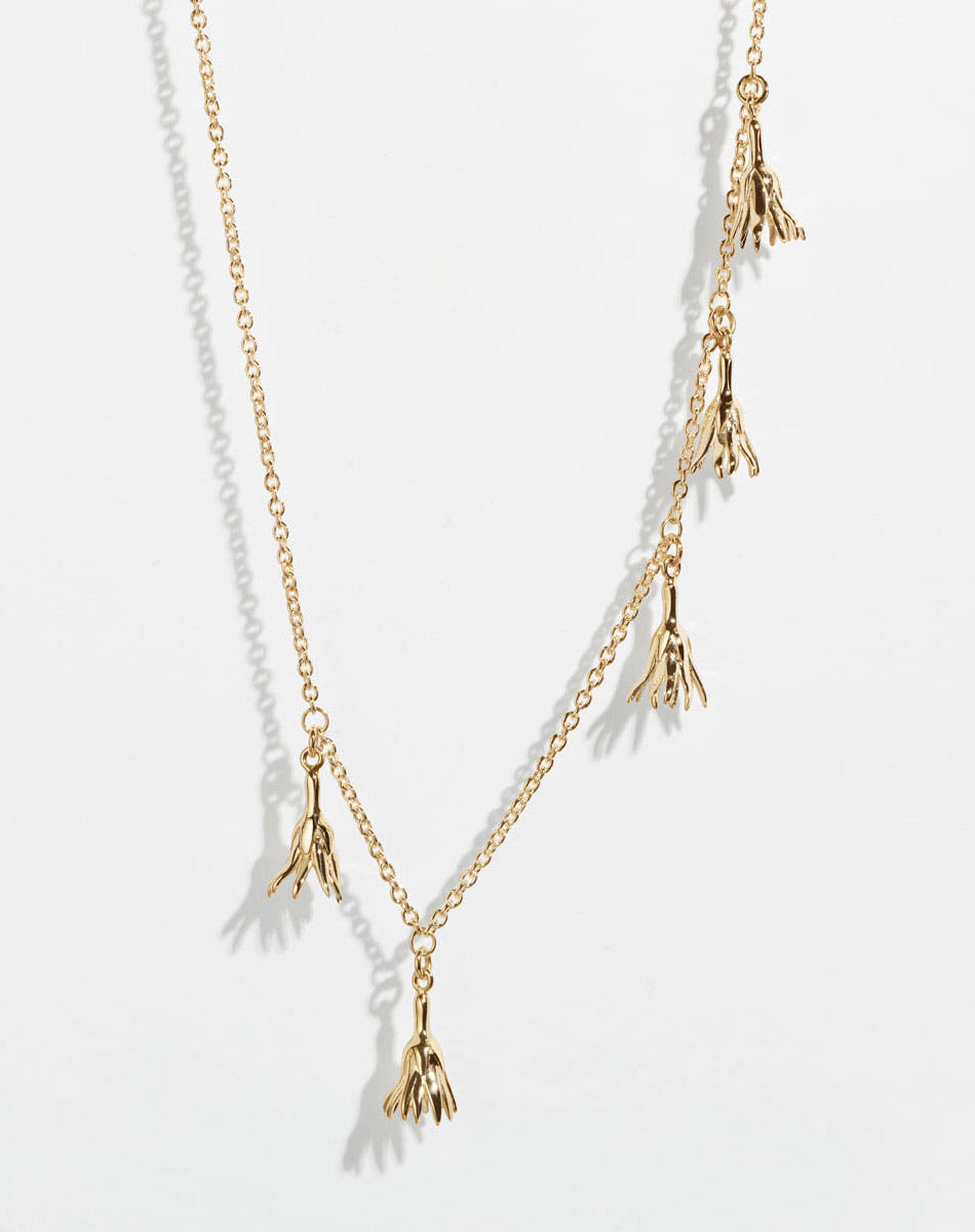 Meadowlark Jewellery’s Magda Five Charm Necklace in 23k Gold Plated Sterling Silver or 9ct Yellow Gold. Five delicate, bell-shaped flower charms suspended from a fine diamond curb chain. A poetic celebration of growth, transformation, and the eternal rhythm of nature. A statement of quiet strength and beauty. From the Dreams collection.