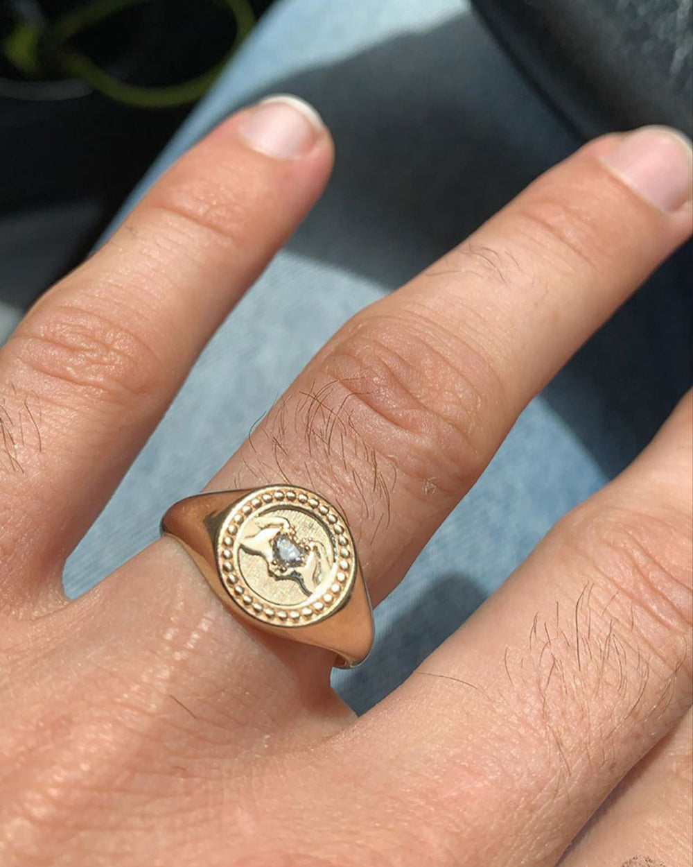 Wynn's bespoke Meadowlark signet ring.
