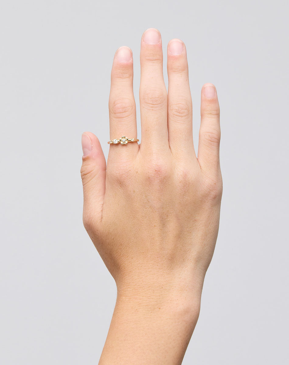 Meadowlark Jewellery’s floral Posie Band in 9ct Yellow Gold, set with round brilliant cut white diamonds. Inspired by classic floral motifs and our beloved Alba designs, a timeless symbol of grace, growth and renewal. Celebrating life’s continual renewal. From the Dreams collection.