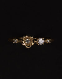 Meadowlark Jewellery’s floral Posie Band in 9ct Yellow Gold, set with round brilliant cut white diamonds. Inspired by classic floral motifs and our beloved Alba designs, a timeless symbol of grace, growth and renewal. Celebrating life’s continual renewal. From the Dreams collection.