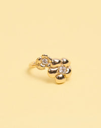 Meadowlark Jewellery’s floral Posie in 9ct Yellow Gold set with round brilliant cut white diamonds. Inspired by classic floral motifs and our beloved Alba designs, a timeless symbol of grace, growth and renewal. Celebrating life’s continual renewal. From the Dreams collection
