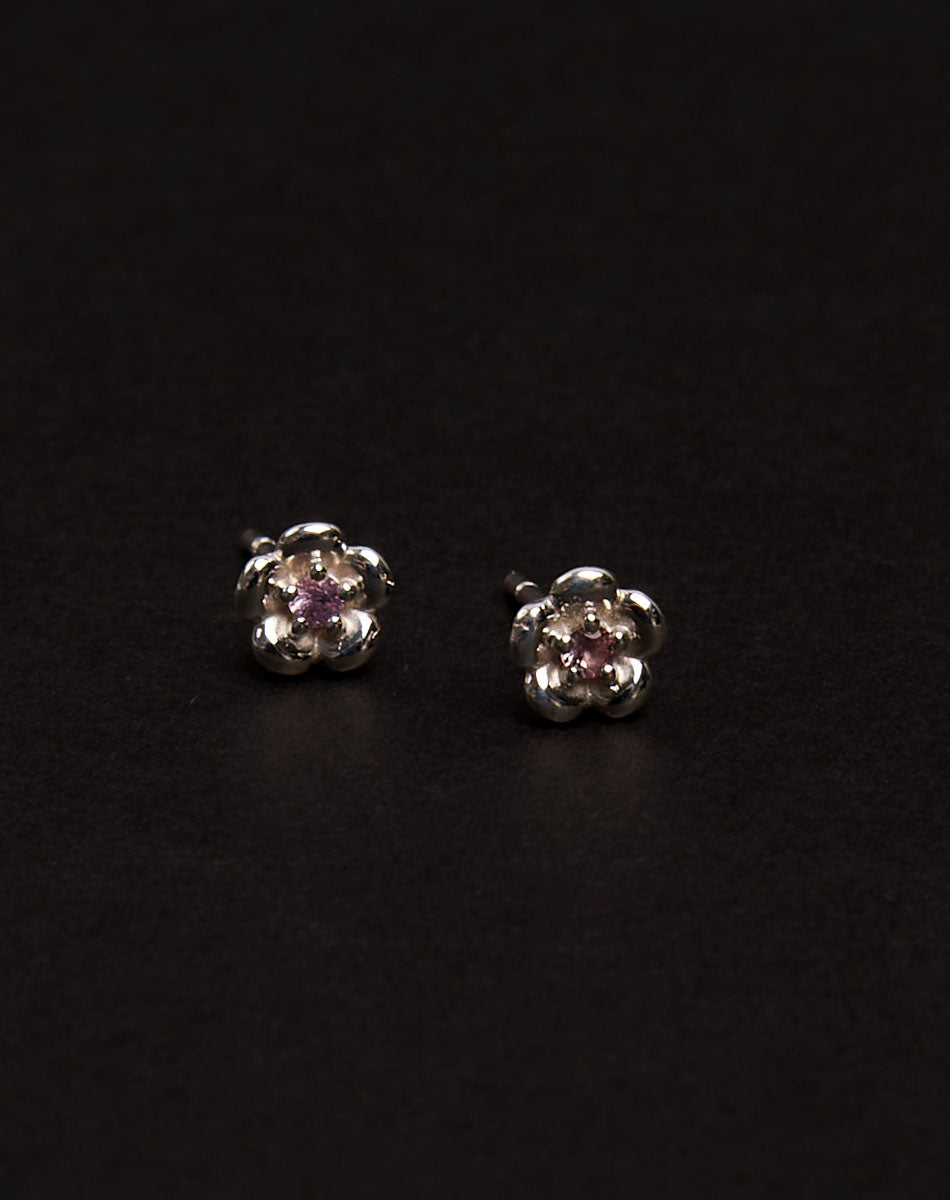 Meadowlark Jewellery’s floral Posie Stud Earrings in Sterling Silver, set with a single round brilliant cut Pink Sapphire stone. Inspired by classic floral motifs and our beloved Alba designs, a timeless symbol of grace, growth and renewal. Celebrating life’s continual renewal. From the Dreams collection.