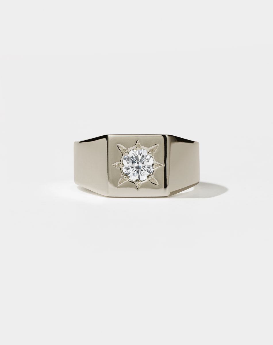 Square Signet Ring with round stone in star setting. 18ct white gold and white diamond