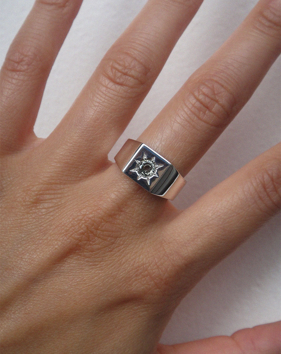Signet Ring with round stone in star setting.  