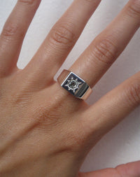 Signet Ring with round stone in star setting.  