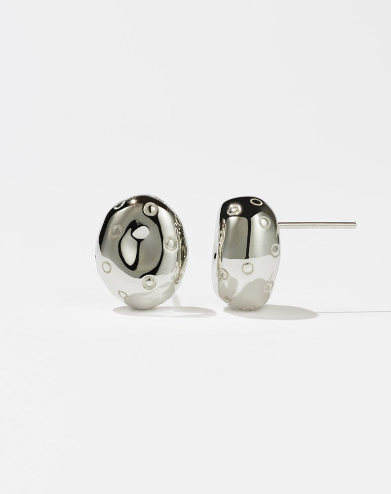 A pair of sterling silver earrings designed in an abstract strawberry shape with leaves on the top, presented against a white background.
