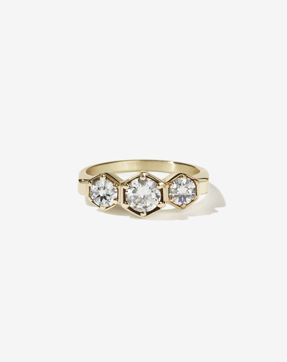 Meadowlark Jewellery’s classic 3 Hexagon Stone Engagement Ring in 9ct Yellow Gold, claw set with 0.95ct round brilliant cut white diamonds. A bold and beloved 3 stone ring, this Ceremonial design is made to order in New Zealand.