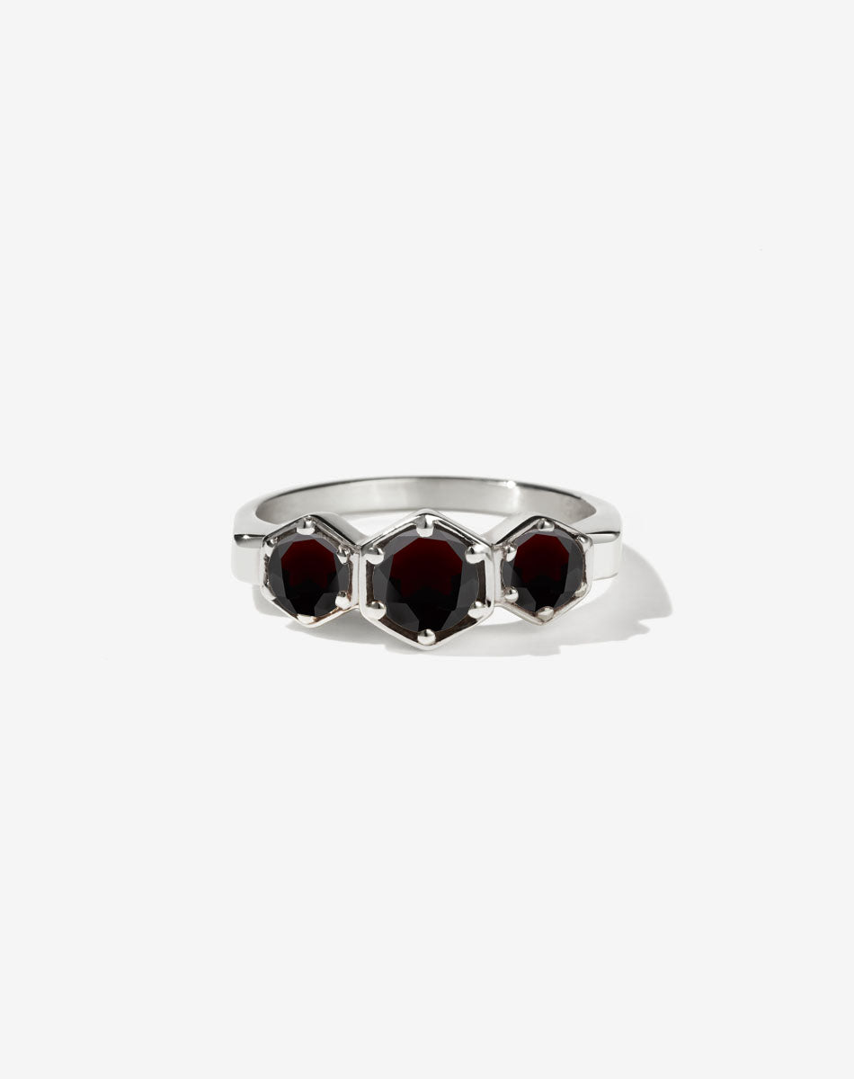 Meadowlark Jewellery’s classic 3 Hexagon Stone Engagement Ring in Sterling Silver, claw set with round brilliant cut Thai Garnet. A bold and beloved 3 stone ring, this Ceremonial design is made to order in New Zealand.