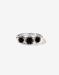 Meadowlark Jewellery’s classic 3 Hexagon Stone Engagement Ring in Sterling Silver, claw set with round brilliant cut Thai Garnet. A bold and beloved 3 stone ring, this Ceremonial design is made to order in New Zealand.