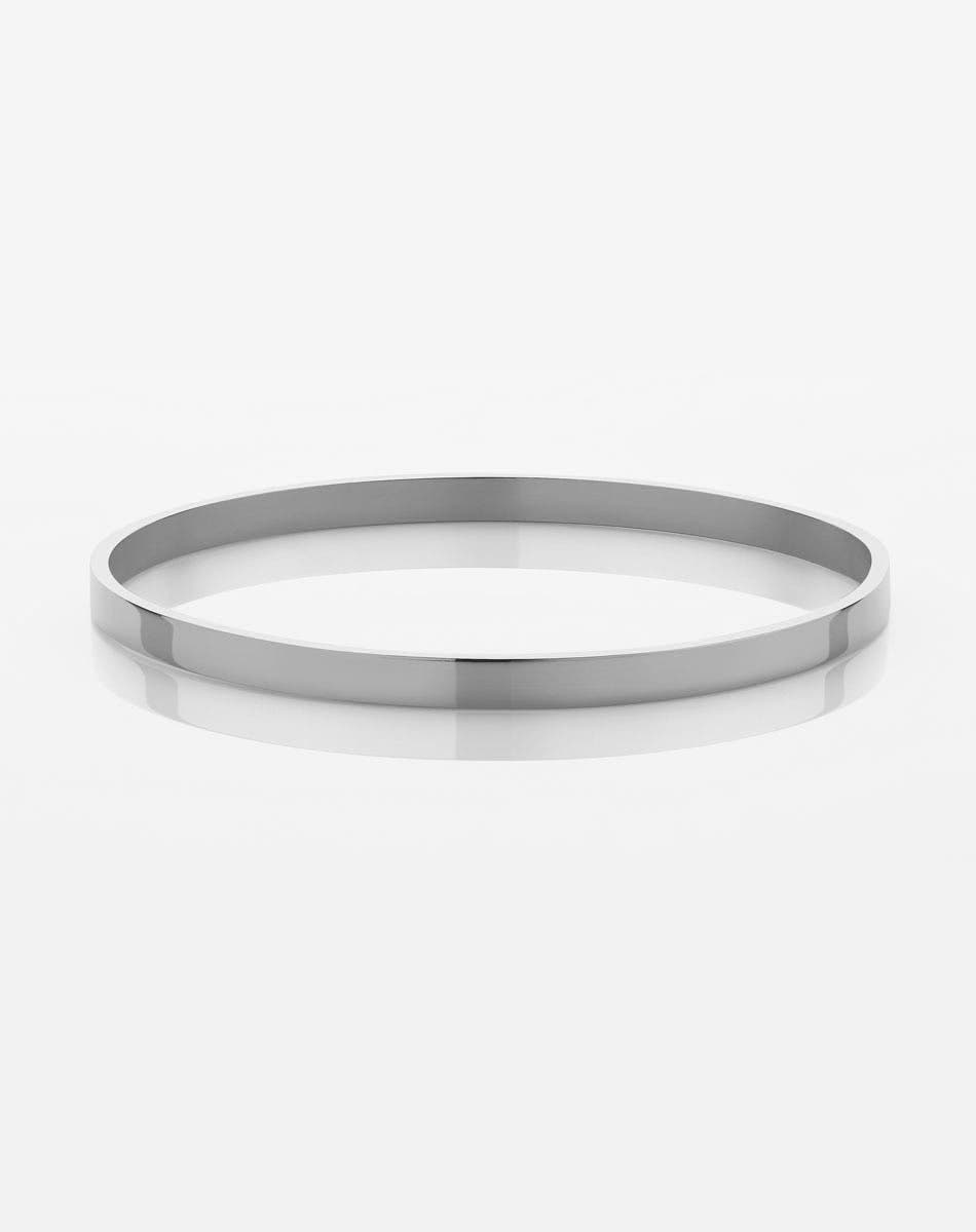 A sleek, silver flat bangle bracelet with a smooth finish, displayed on a white background.