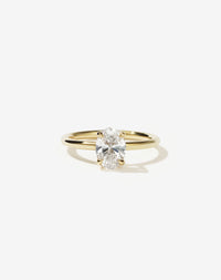 Oval diamond Solitaire Engagement Ring in 18ct yellow gold.