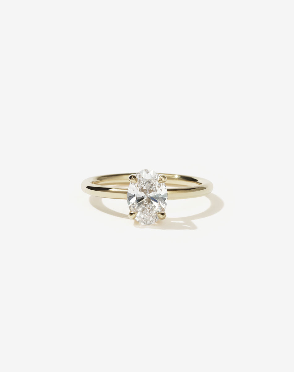 Oval diamond Solitaire Engagement Ring in 9ct yellow gold.