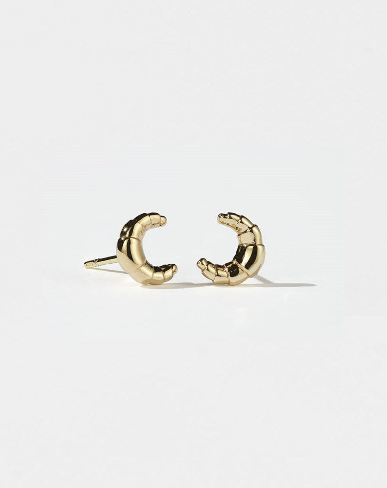 A pair of gold-plated croissant-shaped stud earrings 