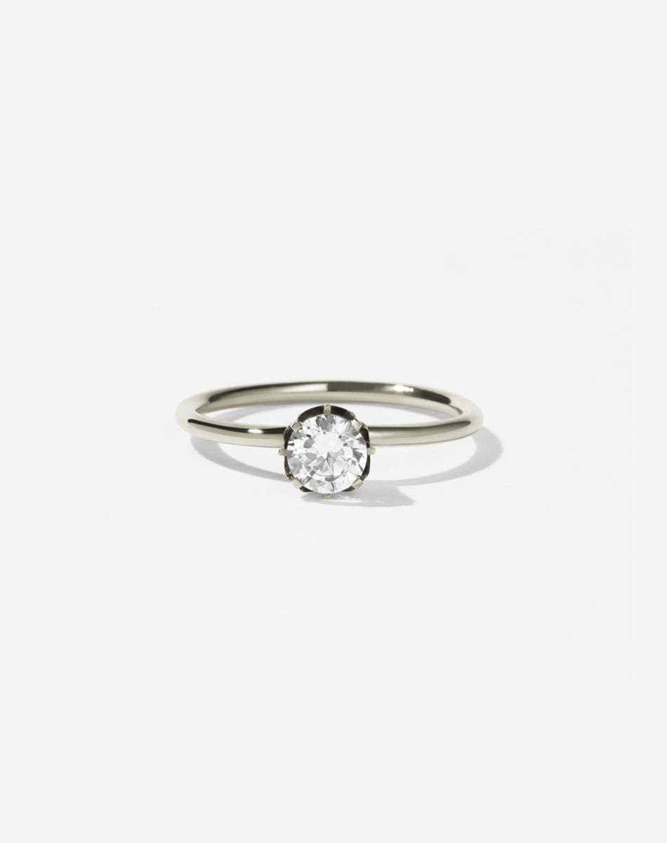 Meadowlark Jewellery’s classic Signature Solitaire Engagement Ring in 9ct White Gold, with 0.46ct round brilliant cut white diamond. Set into our signature Meadowlark claw setting, featuring graphic lines inspired by our insignia. One of our most timeless and beloved Ceremonial designs, made to order in New Zealand. Pair with the diamond pave set Signature Eternity Wedding Band.