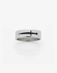 A silver band ring with an etched dagger design on the top surface.