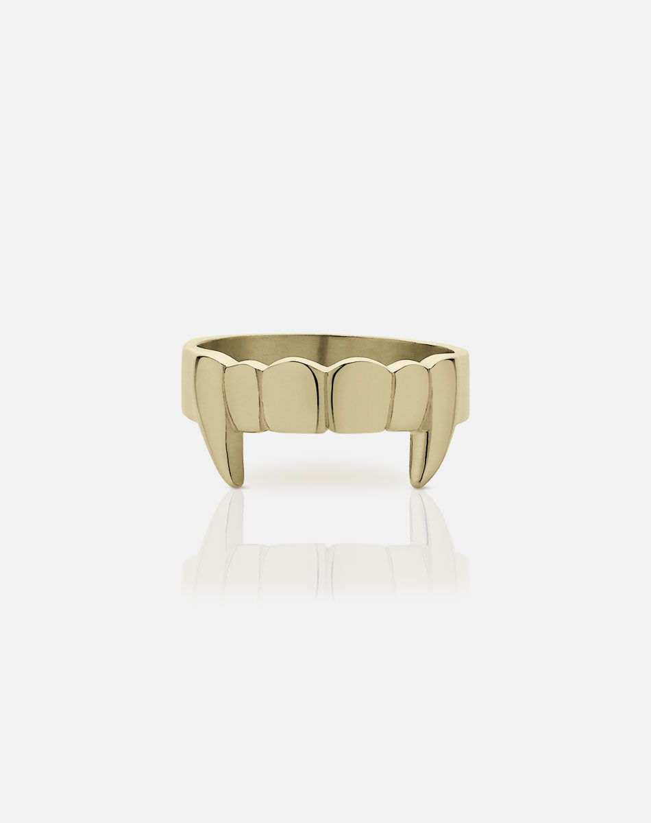 A 9ct solid gold flat band ring with etched teeth and a fang detailing.
