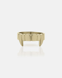 A 9ct solid gold flat band ring with etched teeth and a fang detailing.