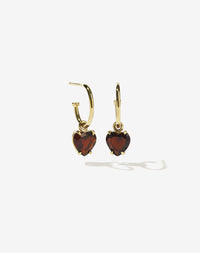 A pair of heart-shaped garnet earrings set in a claw setting, suspended from small hoop earrings, crafted in 9ct solid gold.