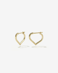A pair of small heart-shaped hoop earrings made of gold.