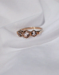Meadowlark Jewellery’s classic 3 Hexagon Stone Engagement Ring in 9ct Yellow Gold claw set with round brilliant cut morganite. A bold and beloved 3 stone ring, this Ceremonial design is made to order in New Zealand.