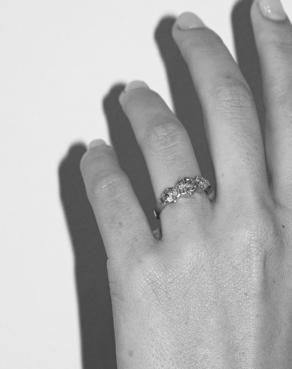 Meadowlark Jewellery’s classic 3 Hexagon Stone Engagement Ring in 9ct White Gold, claw set with 0.95ct round brilliant cut white diamonds. A bold and beloved 3 stone ring, this Ceremonial design is made to order in New Zealand.